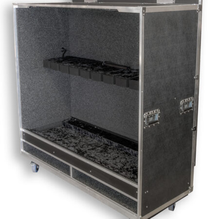 Open, foam-lined equipment case on wheels, showing interior rack with black foam blocks for gear protection.